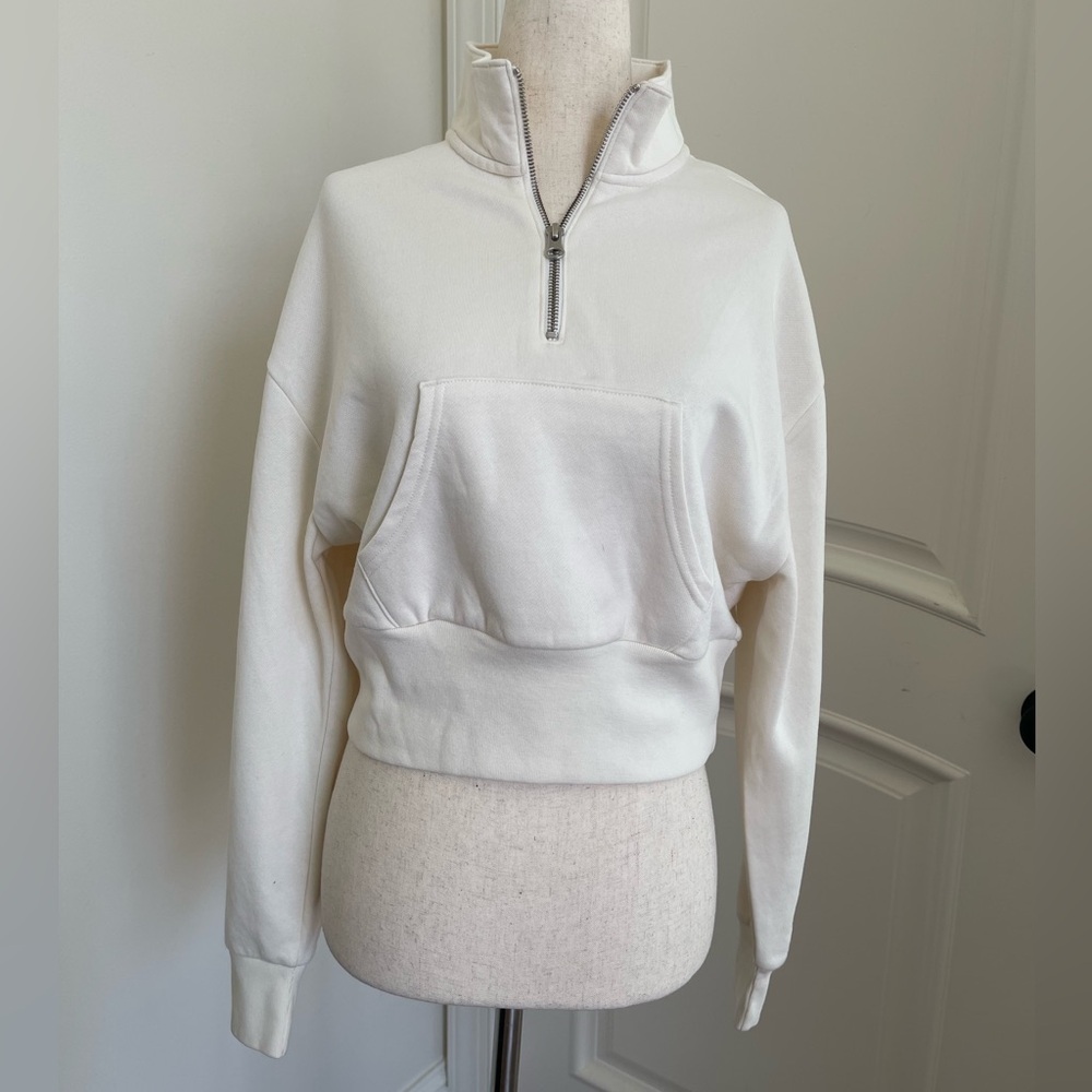 Levi’s Cream colored cropped sweatshirt